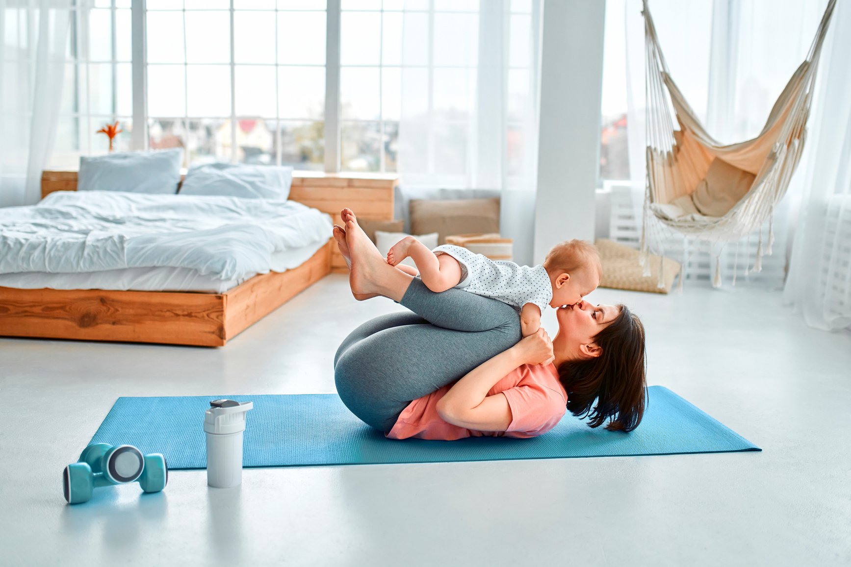 Mother and Baby Doing Yoga 